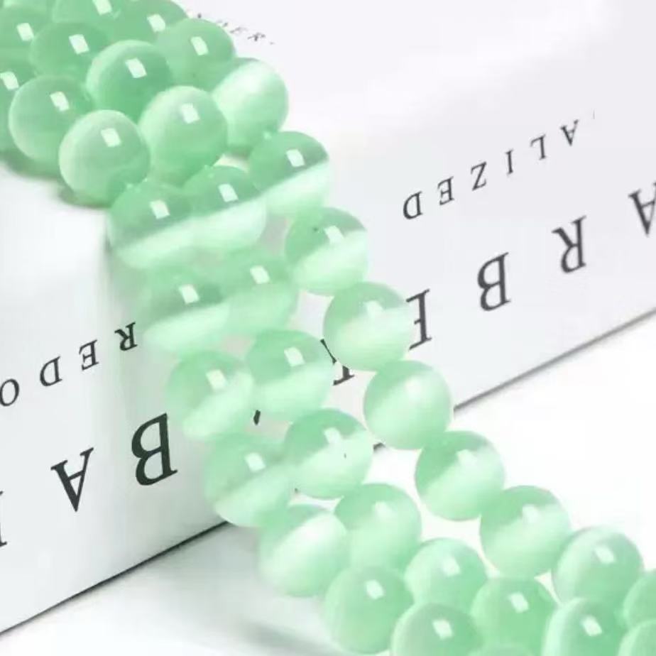 【 A10 】Cat's eye stone beads bind bag- open in live