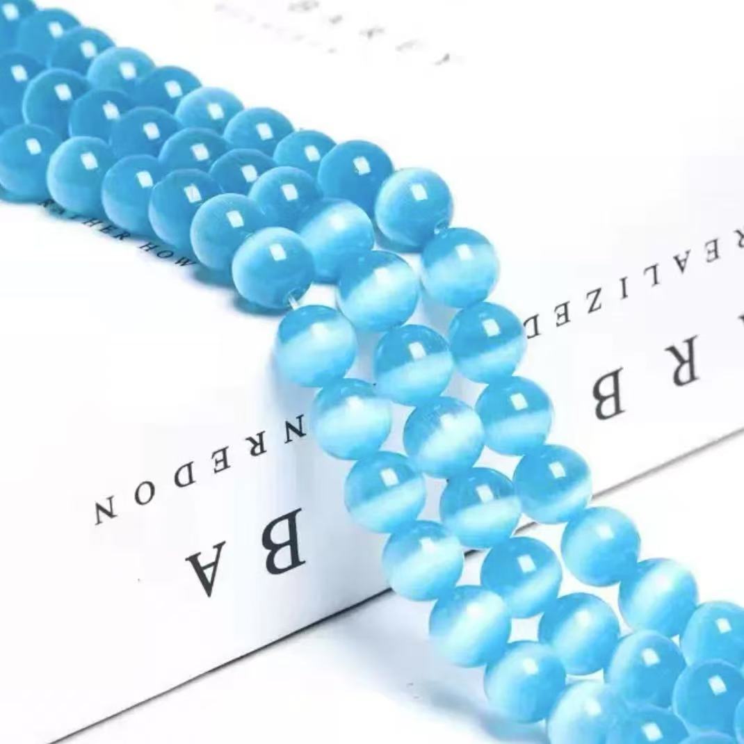 【 A10 】Cat's eye stone beads bind bag- open in live