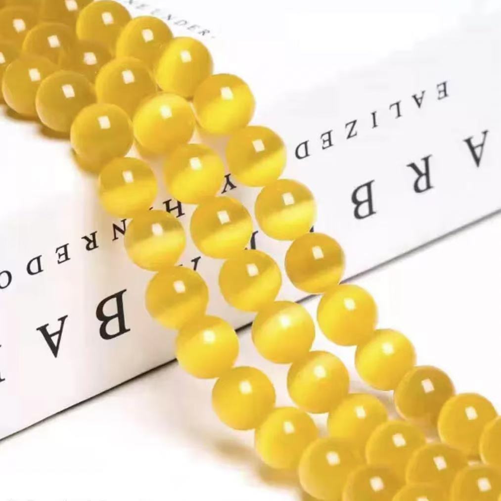 【 A10 】Cat's eye stone beads bind bag- open in live