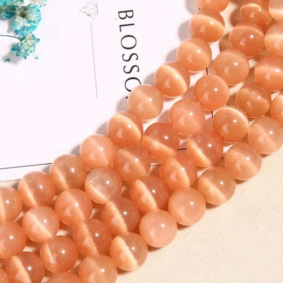 【 A10 】Cat's eye stone beads bind bag- open in live